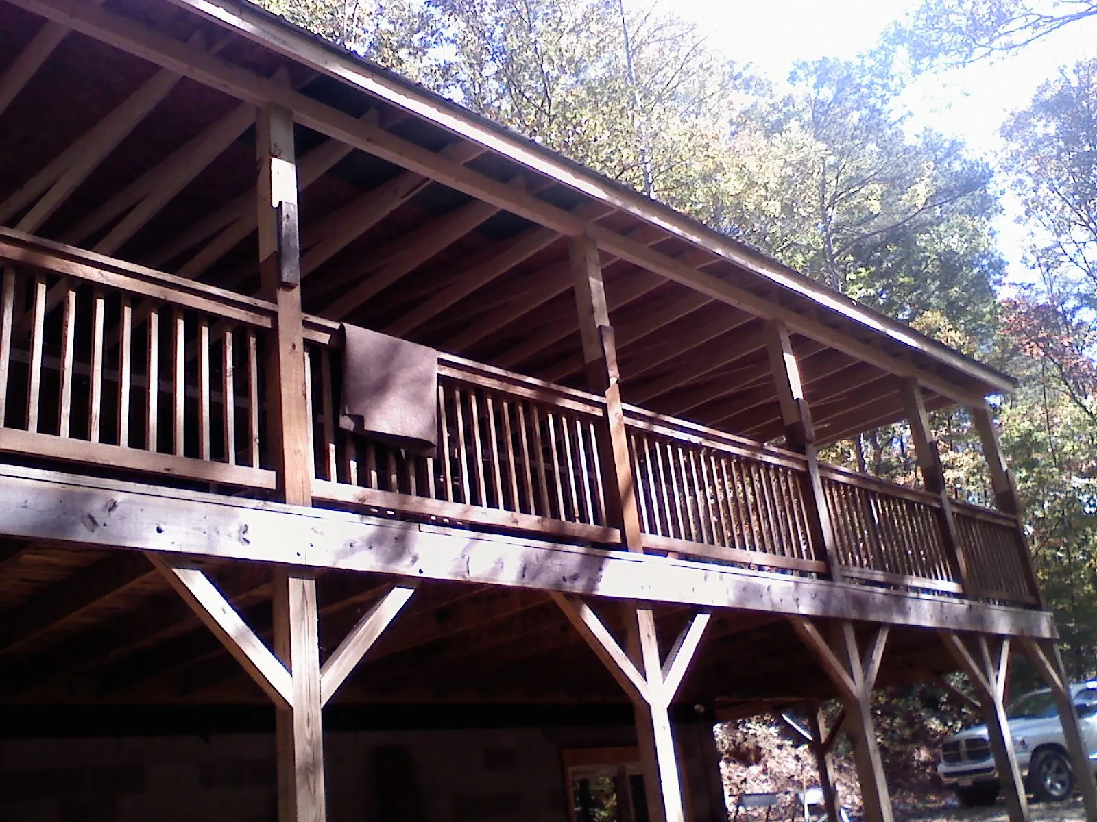 Timber framing under a new elevated porch and deck — Roof Leak Repair in Glenview by Roofing Brothers